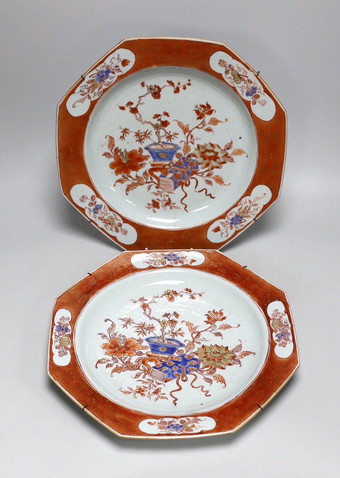 A pair of Chinese rouge de fer and blue enamelled octagonal dishes, early Qianlong period, c.1740, 32.5cm